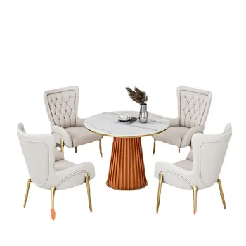 Nordic Hotel кожена арт маса и четири стола, съчетани с кръгла приемна маса и столове